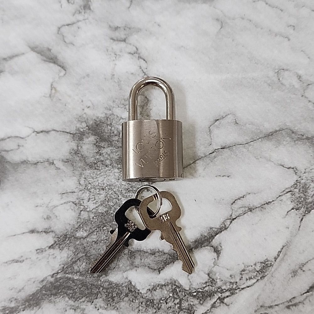 Authentic Louis Vuitton Silver Lock and Keys